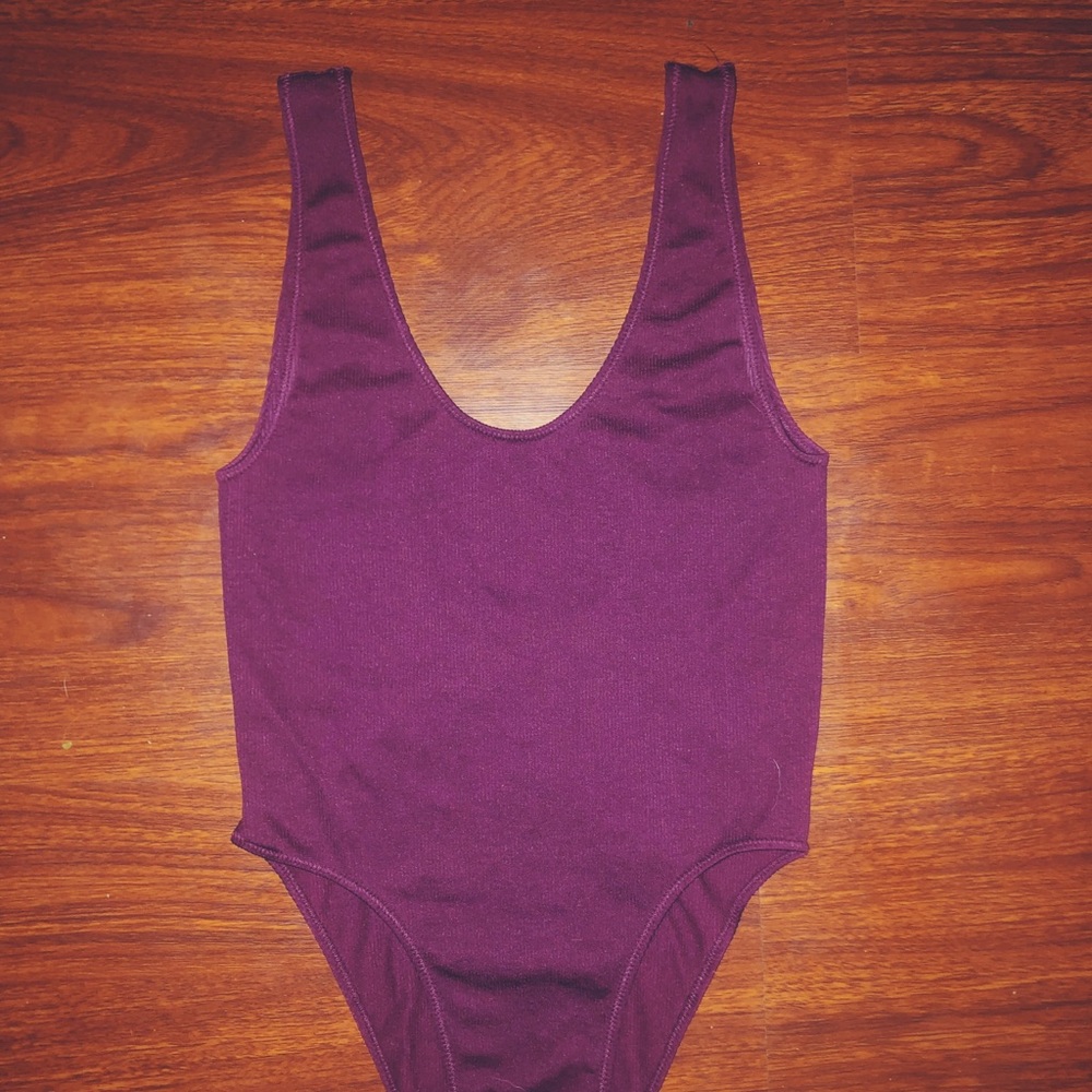 purple bodysuit